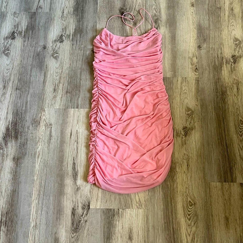 Pink dress, ties in the back